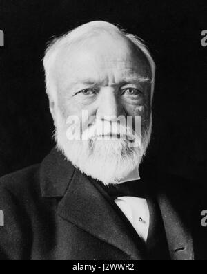 Andrew Carnegie, three-quarter length portrait, seated, facing slightly left, 1913-crop Stock Photo