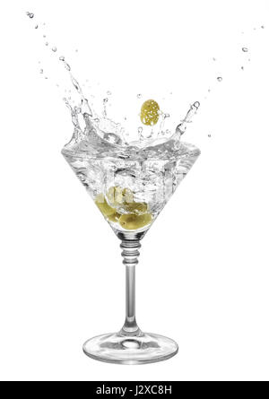 alcohol cocktail with martini and olives in glass with splashes isolated on white background. Splash of martini from the falling green olives Stock Photo