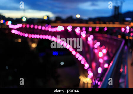 Abstract blurred bokeh lights of a pedestrian bridge Stock Photo