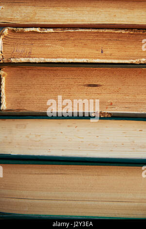 the texture is a stack of old books. Texture or background. Close up Stock Photo