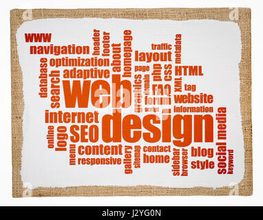 web and website design concept - a word cloud on a primed burlap art canvas Stock Photo