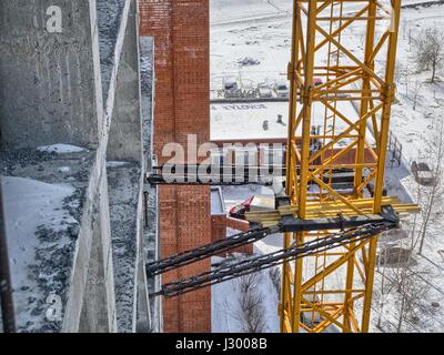 Crane attached to building Stock Photo