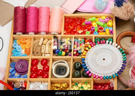 set of accessories and jewelry to embroidery, sewing accessories top view, seamstress workplace, many object for needlework, embroidery, handmade and  Stock Photo