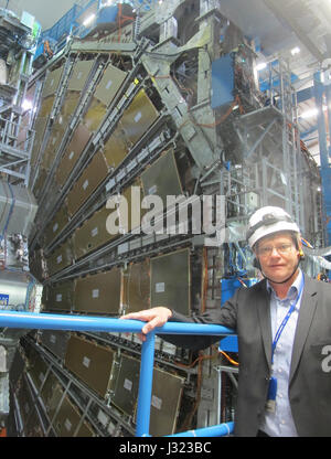 Freiburg-based physicist Karl Jakobs explains aspects of the Atlas particle experiment currently being conducted by the European Organization for Nuclear Research (Cern) in Geneva, Switzerland, 2 May 2017. The Atlas particle detector is part of the Large Hadron Collider (LHC) situated some 100 metres below the earth. European researchers are on the hunt for dark matter - a hypothesized and as yet undiscovered form of matter. Photo: Christiane Oelrich/dpa Stock Photo