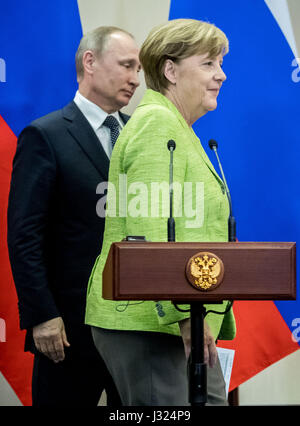 Sochi, Russia. 2nd May, 2017. German Chancellor Merkel stands next to ...