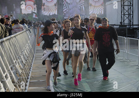 Tokyo, Japan. 30th Apr, 2017. Atendees walk as they exit the Marrins Stadium in Chiba during the EDC Japan on Sunday April 30, 2017. Photo by: Ramiro Agustin VArgas Tabares Credit: Ramiro Agustin Vargas Tabares/ZUMA Wire/Alamy Live News Stock Photo
