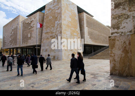 Malta's new Parliament House, completed in 2015 to designs by the noted Italian Architect Renzo Piano, is next to the medieval City Gate, Stock Photo