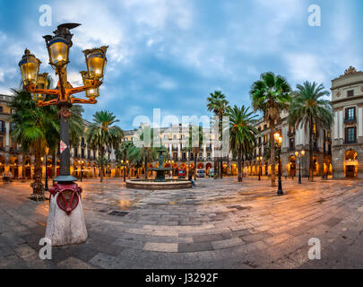 BARCELONA, SPAIN - NOVEMBER 17, 2014: Placa Reial in Barcelona, Spain. The square, with lanterns designed by Gaudi and the Fountain of Three Graces in Stock Photo