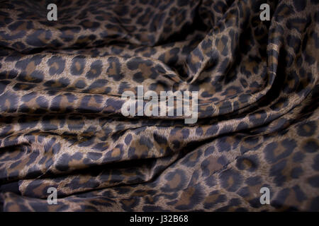 shiny leopard fabric cloth garment textile industry Stock Photo