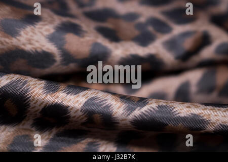 shiny leopard fabric cloth garment textile industry Stock Photo