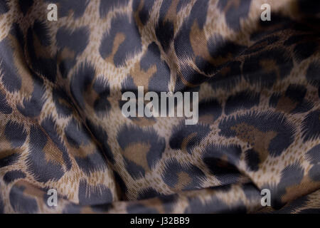 shiny leopard fabric cloth garment textile industry Stock Photo