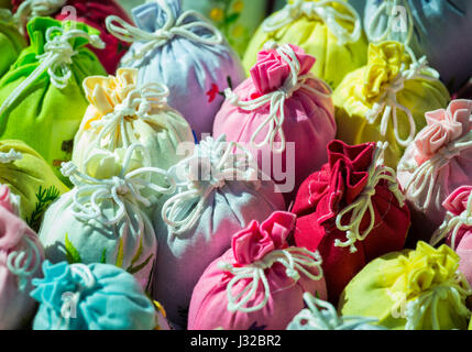 Colorful lavender bags in embroidered gift cloth sacks tied with string Stock Photo