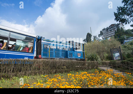 DARJEELING, INDIA – NOVEMBER 27, 2016: steam engine hauled DHR Toy Train has been operating on 2-foot gauge tracks since 1880s and gained the UNESCO W Stock Photo