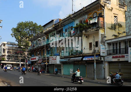 HO CHI MINH CITY, VIET NAM- APRIL 18, 2017: Scene of old apartment building at Cho Lon on day, amazing ancient architecture of China town, Vietnam Stock Photo