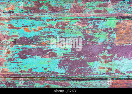 Abstract grunge wood planks texture background with peeling blue paint Stock Photo