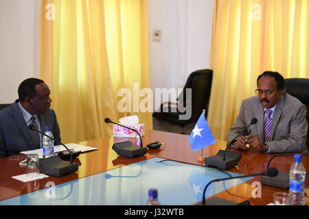 The newly elected President of Somalia, Mohamed Abdullahi Farmajo (right) in a meeting with the Special Representative of the African Union Commission Chairperson (SRCC) for Somalia, Ambassador Francisco Madeira at Villa Somalia on February 18, 2017.  AMISOM Photo / Ilyas Ahmed Stock Photo