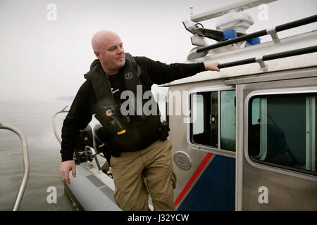 Marine interdiction agents with U.S. Customs and Border Protection, Air and Marine Operations monitor and secure the waterways around the Washington, D.C., area January 17, 2017, ahead of the inauguration of the 45th President, Donald J. Trump set for Friday, January 19, 2017 . U.S. Customs and Border Protection Photo by Glenn Fawcett Stock Photo