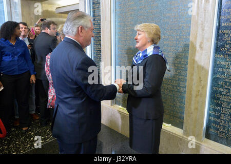 U.S. Secretary of State Rex Tillerson and his wife, Renda St. Clair, speak with Ambassador Barbara Stephenson, President of the American Foreign Service Association (AFSA), in front of the AFSA Memorial Plaque in the main lobby of the Department's Harry S. Truman building in Washington, D.C., on his first day as Secretary of State on February 2, 2017. Stock Photo