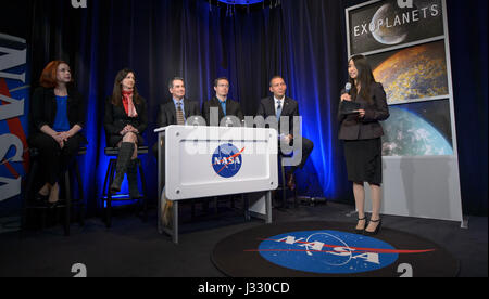 NASA Public Affairs Officer Felicia Chou, right, moderates a TRAPPIST-1 planets briefing with presenters, from left, Astronomer at the Space Telescope Science Institute in Baltimore Nikole Lewis, Professor of planetary science and physics at Massachusetts Institute of Technology, Cambridge, Sara Seager, Manager of NASA's Spitzer Science Center at Caltech/IPAC, Pasadena, California Sean Carey, University of Liege in Belgium Astronomer Michael Gillon, and NASA Associate Administrator of the Science Mission Directorate Thomas Zurbuchen, Wednesday, Feb. 22, 2017 at NASA Headquarters in Washington.