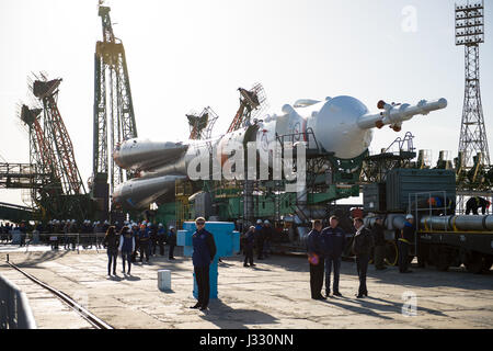 The Soyuz MS-04 spacecraft is seen shortly after arriving at the launch pad by train on Monday, April 17, 2017, at the Baikonur Cosmodrome in Kazakhstan.  Launch of the Soyuz rocket is scheduled for April 20 Baikonur time and will carry Expedition 51 Soyuz Commander Fyodor Yurchikhin of Roscosmos and Flight Engineer Jack Fischer of NASA into orbit to begin their four and a half month mission on the International Space Station. Photo Credit: (NASA/Aubrey Gemignani) Stock Photo