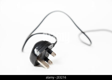 Three pin plug with cable, UK Stock Photo