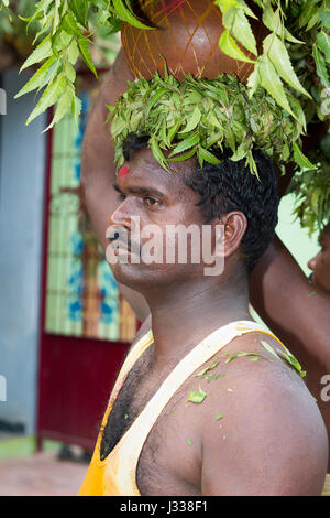 Illustrative image. Pondicherry, Tamil Nadu, India - April 14, 2014. Temple festival at Pondicherry, people in the street dancing meditating priest Stock Photo
