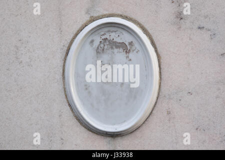 Badly damaged photograph on the tombstone of Soviet military officer Pavel Danilevsky on the Soviet War Memorial at the Kerepesi Cemetery in Budapest, Hungary. Major Pavel Danilevsky was born on May 18, 1896, served in Budapest as the assistant of the head of the Soviet military hospital after World War II and died of unspecified disease on November 16, 1945 at age 49. Stock Photo