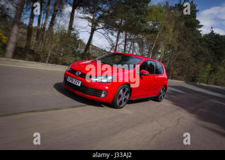 Volkswagen Golf GTI Mk6  being driven at Longcross Testing Circuit, Chobham Race Track, Surrey, England. Stock Photo