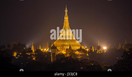 Illuminated Shwedagon Pagoda at night, Yangon, Myanmar Stock Photo
