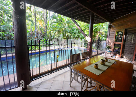 Property in the tropics with a swimming pool in lush vegetation, Trinity Beach, near Cairns, Far North Queensland, FNQ, QLD, Australia Stock Photo