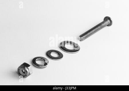 Exploded view of bolt, washer and nut set. Stock Photo