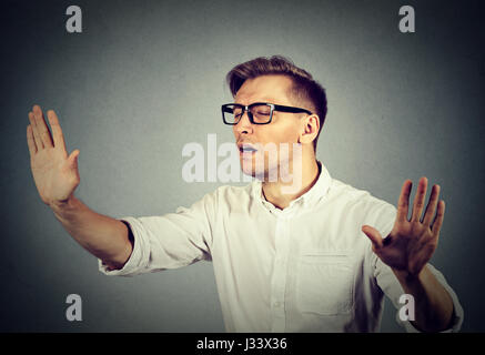 Blindfolded Man Stretching His Arms Out Walking Through Many Question Marks  Stock Photo - Download Image Now - iStock