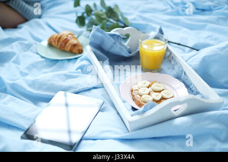 Morning. Yummy breakfast in bed Stock Photo