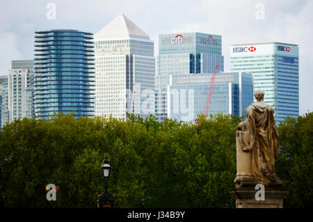 Canary Wharf in London as seen from Royal Borough of Greenwich with the statue of King George II in the foreground in 2017, London, England, UK Stock Photo