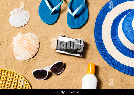 Summer vacation composition. Flip flops, hat and other stuff Stock Photo