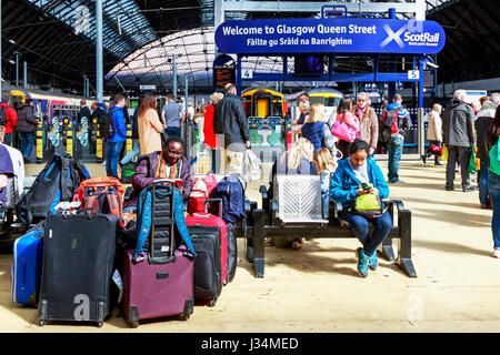 Passengers waiting at Queen Street railway station, Glasgow, Scotland, UK Stock Photo