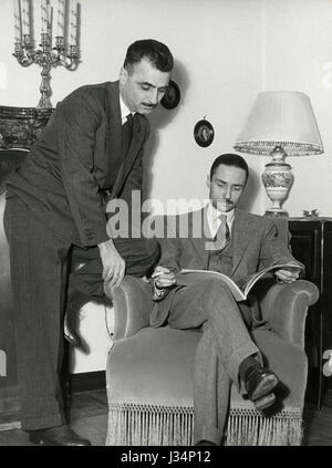 Italian movie director Mario Monicelli and Steno at home, 1954 Stock Photo