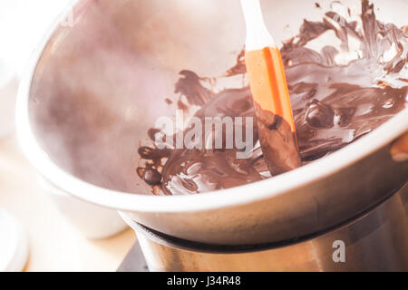 Melting chocolate in a bowl Stock Photo