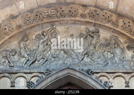 Stoning of Saint Stephen (1813) depicted in the tympanum of the main portal of the Dijon Cathedral (Cathedrale Saint-Benigne de Dijon) in Dijon, Burgundy, France. Stock Photo