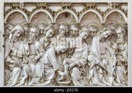 Christ Washing the Feet of the Apostles. Detail of the ivory altarpiece of the Scenes of the Passion of Christ dated from ca. 1375-1400 on display in the Musee des Beaux-Arts de Dijon (Museum of Fine Arts) in Dijon, Burgundy, France. Stock Photo