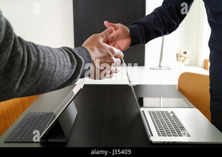 Business partnership meeting concept.photo businessmans handshake. Successful businessmen handshaking after perfect deal Stock Photo
