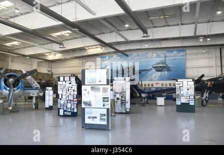 PALM SPRINGS, CA - MARCH 24, 2017: Palm Springs Air Museum, Hangar exhibits with vintage plane at the Palm Springs Air Museum. Stock Photo