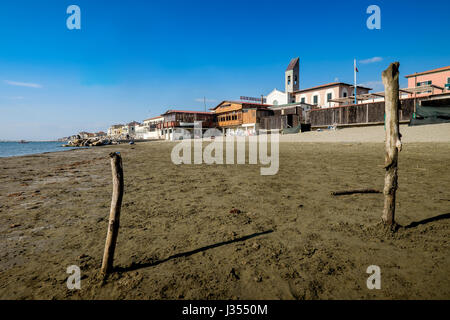 MARINA DI PISA, ITALY - Avril 24, 2017: View of the sea and the beach of white pebbles in Marina di Pisa Tuscany Stock Photo