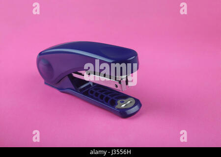 A stapler isolated on a plain background Stock Photo