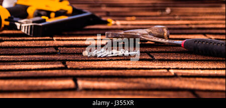 roof shingles, roofing tool/ installation Stock Photo