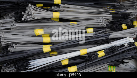 A selection of bundled cable ties Stock Photo