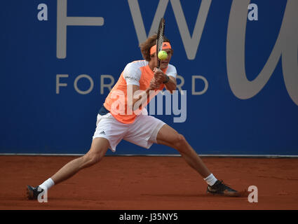 Munich, Germany. 03rd May, 2017. Alexander Zverev from Germany plays against France's Chardy during their men's singles tennis match at the ATP Tour in Munich, Germany, 03 May 2017. Photo: Angelika Warmuth//dpa/Alamy Live News Stock Photo