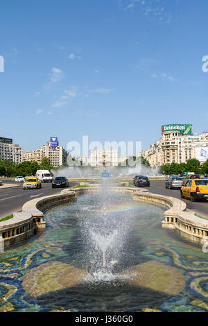 BUCHAREST, ROMANIA - MAY 19, 2015: Rush Hour Traffic In Union Square (Piata Unirii) one of the busiest and largest traffic intersections in downtown B Stock Photo