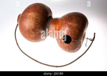 African handmade instrument, blowing, isolated on white background Stock Photo