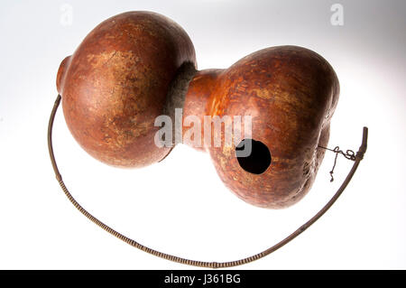 African handmade instrument, blowing, isolated on white background Stock Photo